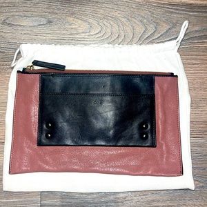 Chloé The French luxury brand clutch bag. Comes with authentication card.